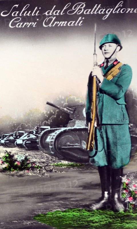 Italian world War Two postcard showing an infantry soldier with rifle near a line of tanks