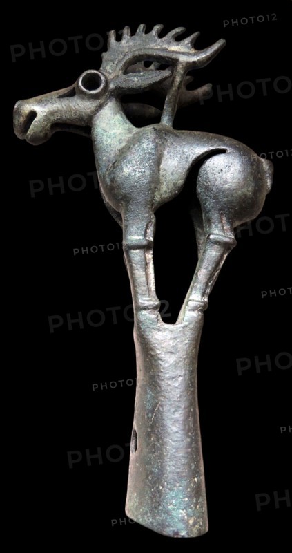 Bronze pole-top in the form of an elk. Ordos type, 6th-5th century BC.