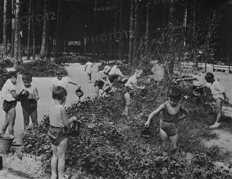 Nursery school children out of doors