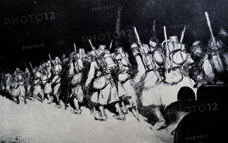 French soldiers march at night to the Verdun front;   during WWI 1916