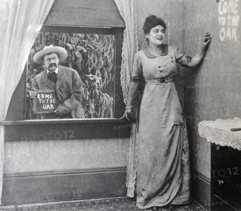 An assignation in a film entitled "Curses! They Remarked", 1914