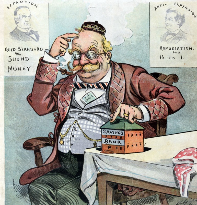 An elderly German American man pointing to a coin bank