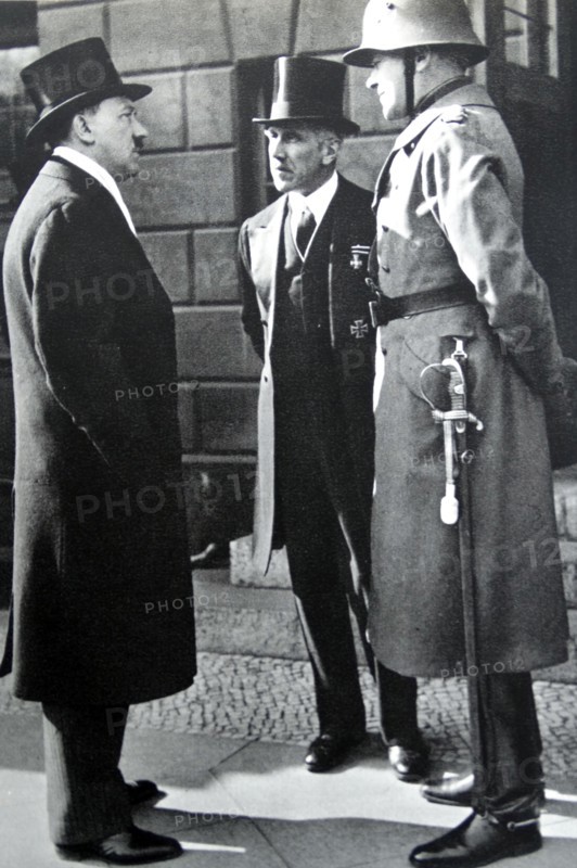 Adolf Hitler ; Franz von Papen (centre) and General Werner von Blomberg