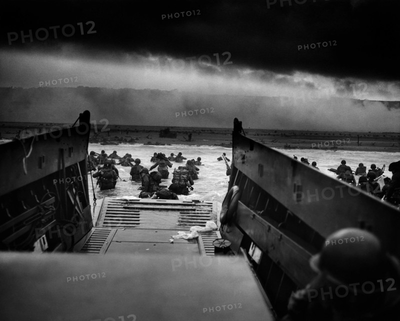 Photograph of U.S Troops rushing to the Normandy Beaches