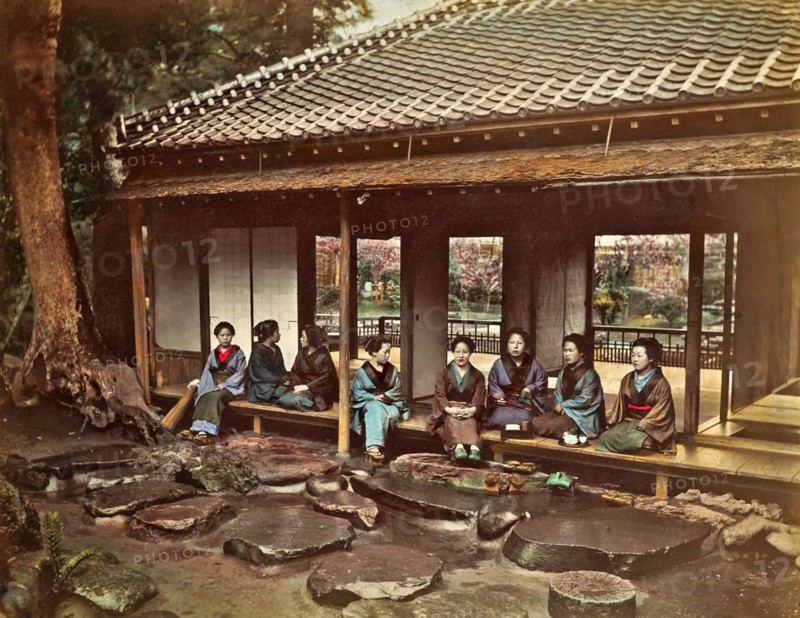 Colour photograph of a Japanese Tea House with girls waiting to attend clients