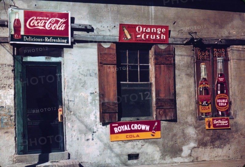 Colour photograph of a shanty town bar