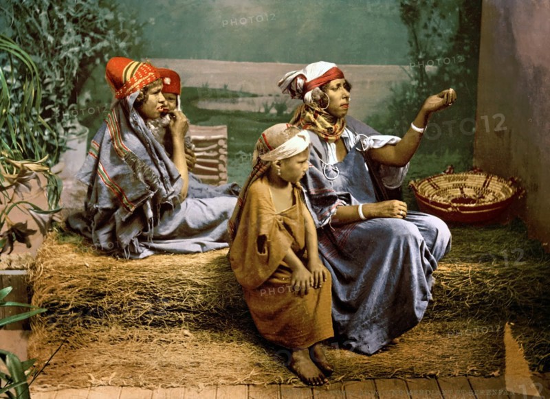 Colour photograph of Bedouin beggars and children