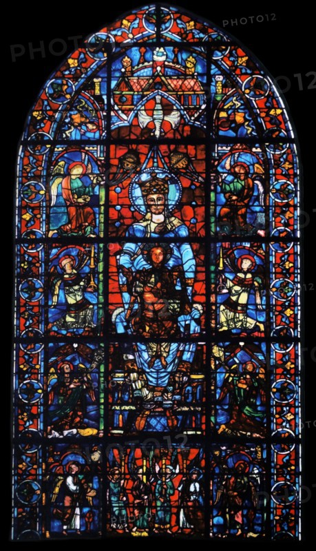 window from the South Choir aisle in Chartres Cathedral, France. Shows The Virgin Mary with the infant Christ