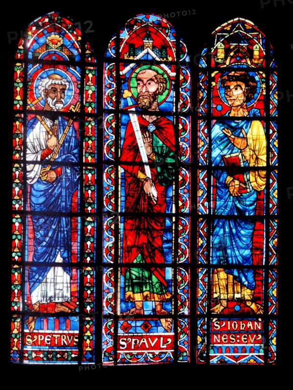 Stained glass Bourges Cathedral, France. the Apostles; Peter, Paul and John;