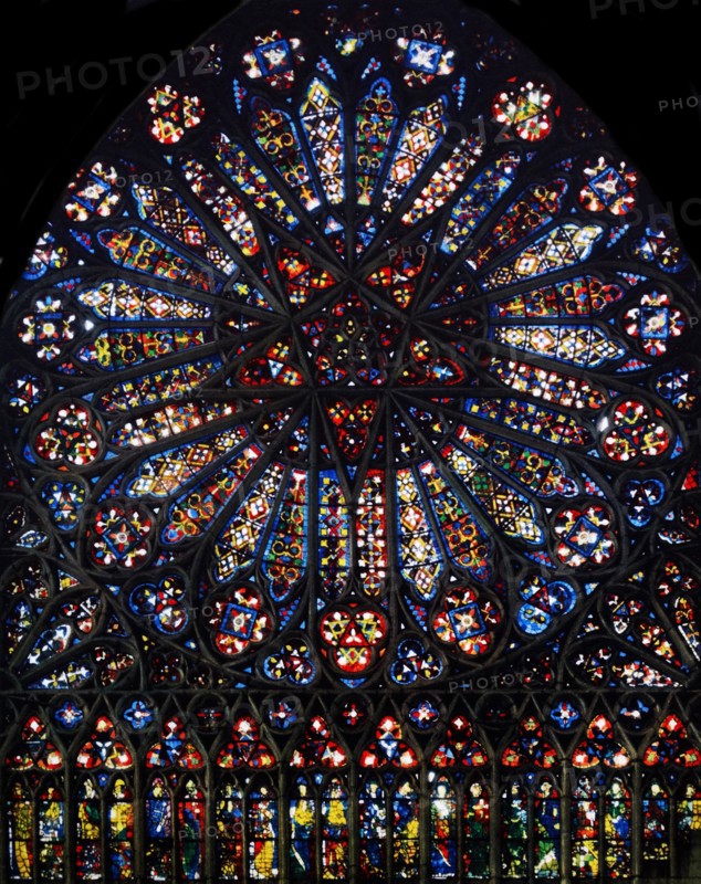 Stained glass rose window from Amiens Cathedral, France. 14th century