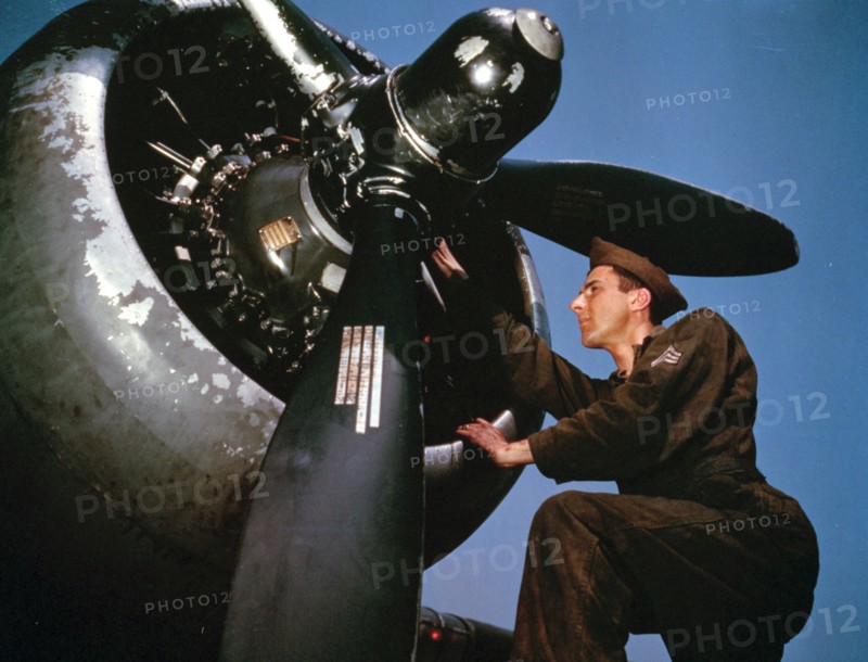 Colour photograph of the servicing of an A-20 bomber