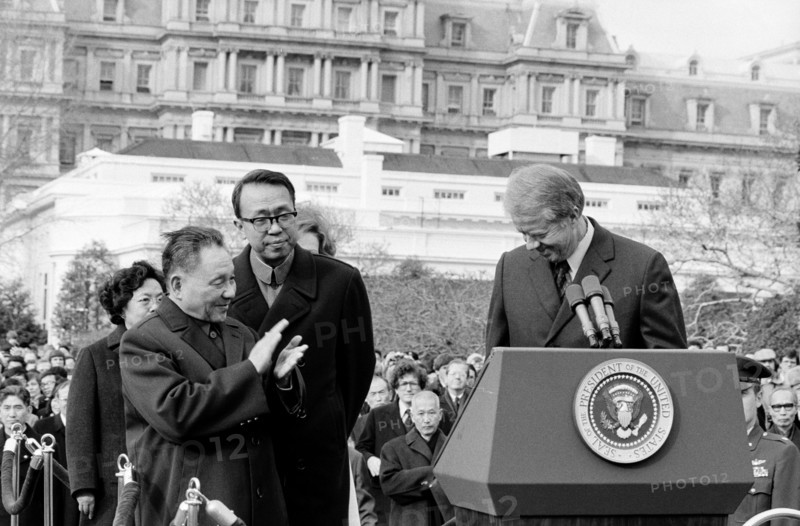 Photograph of the Chinese Vice Premier Deng Xiao Ping applauding President of the United States Jimmy Carter