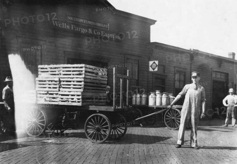 Expressmen in front of a Wells Fargo & Co Express depot