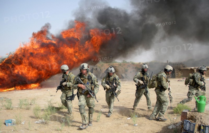Afghan and DEA Special Agents destroying hashish bunkers