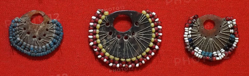 Tortoise-shell earrings from Papua New Guinea, with glass beads traded from Europe, Circa 1900