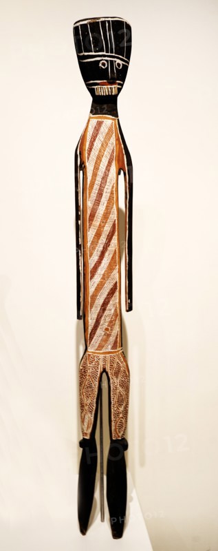 Mouky human shaped figure carved from wood