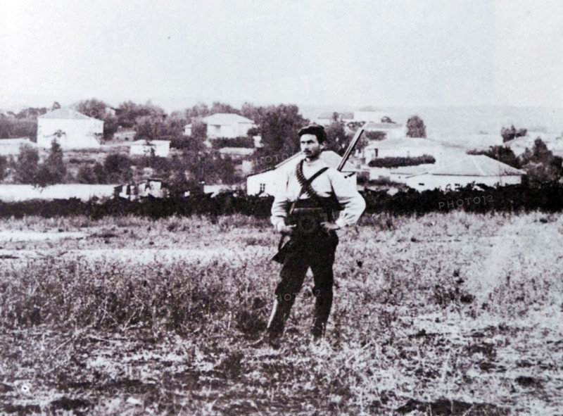 Jewish 'Shomer' settler guard in afield protecting the village of Rehovot