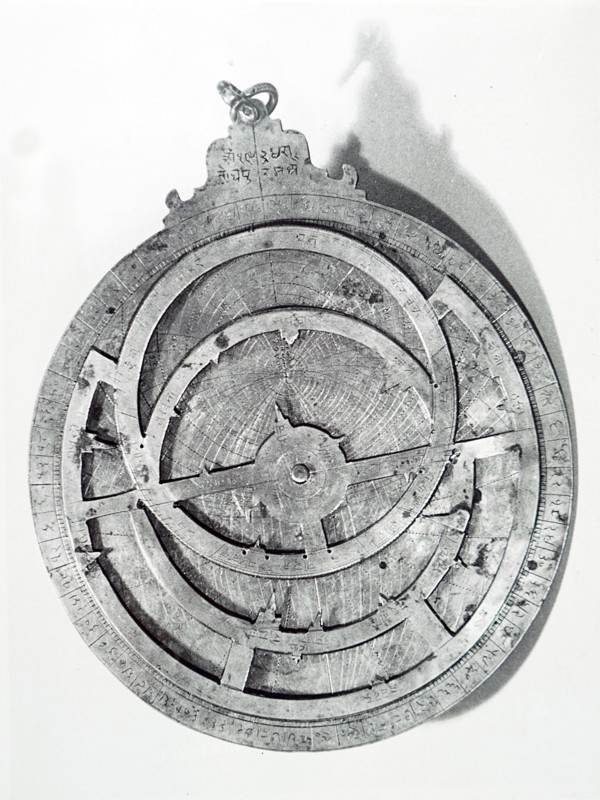 View of the front of a brass astrolabe