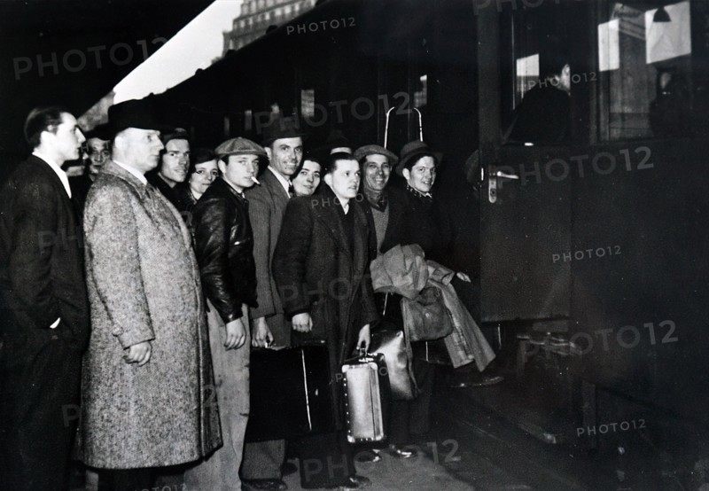 Photograph of young French men travelling by train to enlist in the military during the invasion of France in World War Two