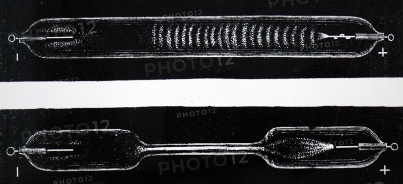 A Geissler tube, an early gas discharge tube used to demonstrate the principles of electrical glow discharge, similar to modern neon lighting