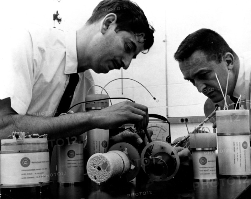 Photograph of eight superconducting magnets undergoing final testing at Westinghouse Electric Corporation's cryogenic systems department