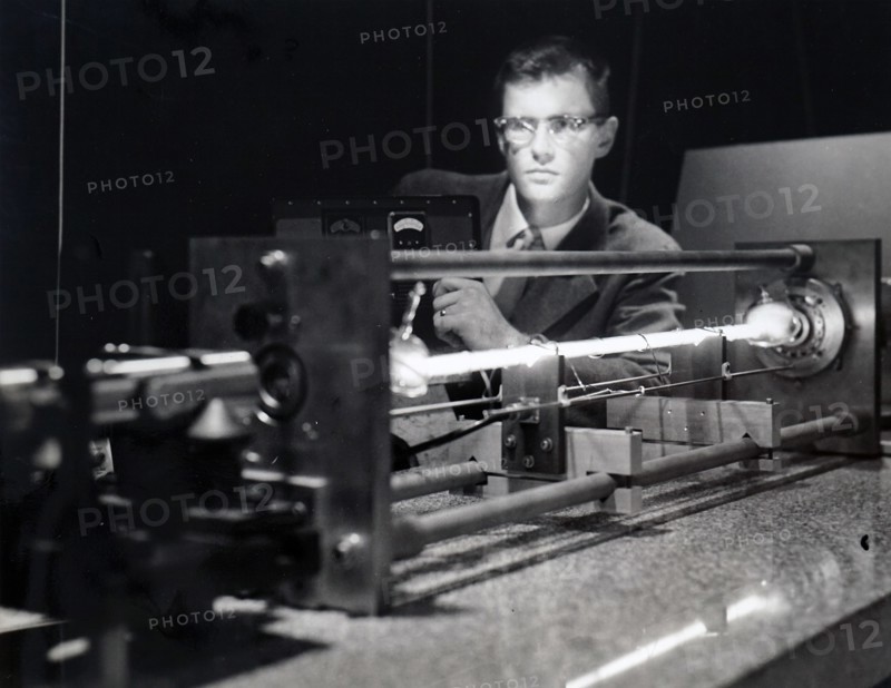 Photograph of a LASER FOR SPACE — Gas-filled electronic device whose first job will be to greatly sharpen the accuracy of a new space tracking radar is fired up by an engineer at Sperry Rand's Electronic Tube Division laboratories in Great Neck, N