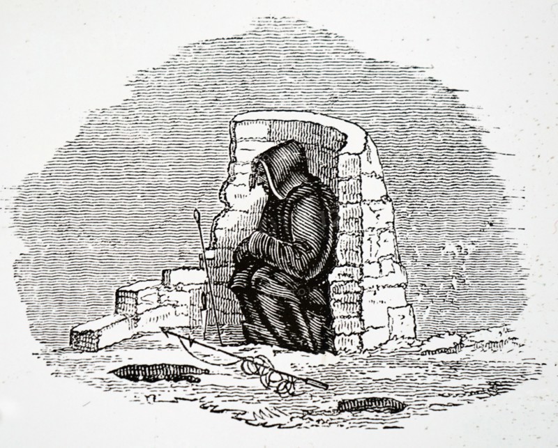 An Eskimo hunting a seal