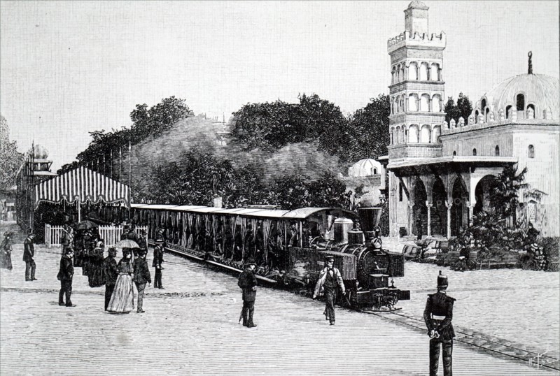 A Decauville locomotive carrying passengers in the Esplanade des Invalides, Paris