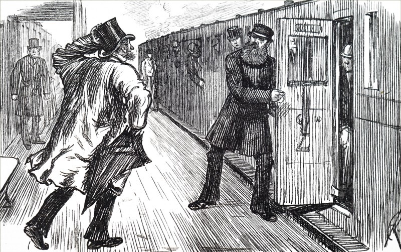 A train guard about to close the carriage door as a flustered man rushes to reach the train before it leaves