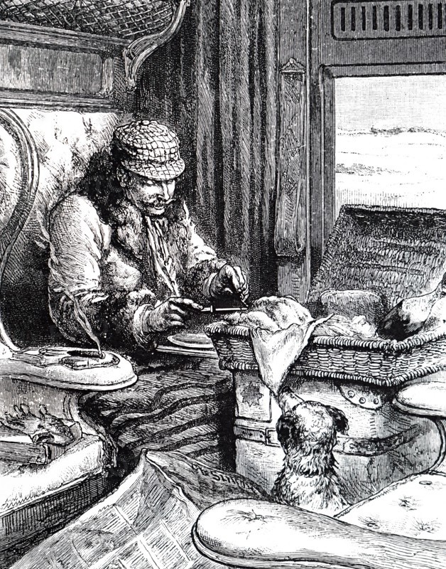 A man in a first class carriage preparing to eat his lunch