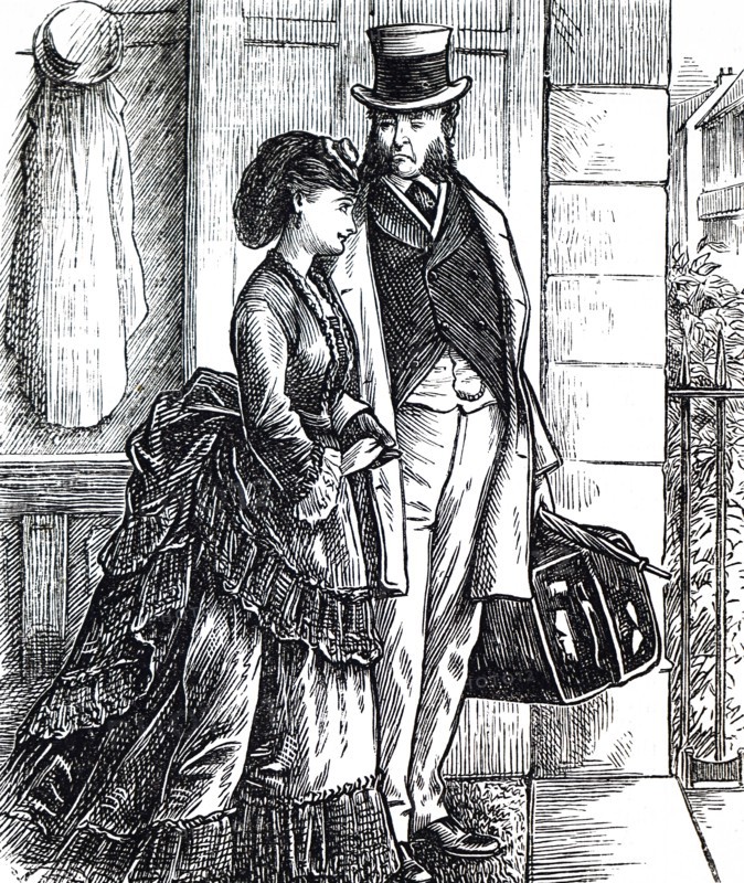 A father and daughter walking together toward the train station