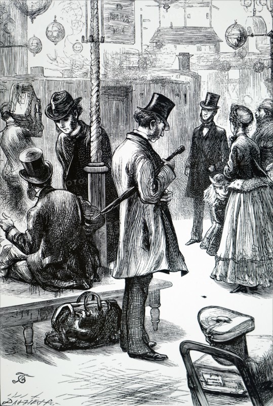A railway station waiting area, where passengers are seen waiting for their train