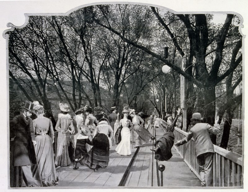 Photograph of the moving pavement, showing a woman falling off.
