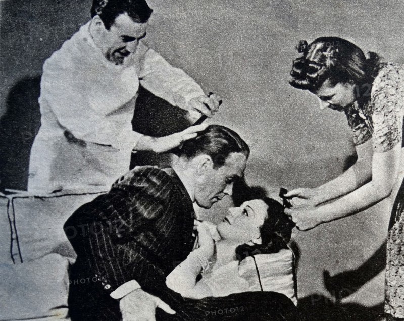 Gerry Fairbanks and Joan Collins on a film set