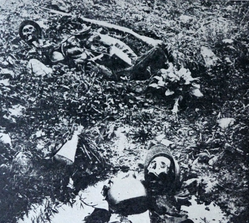 The remains of two French soldiers lie in a shell crater at Verdum during World War I
