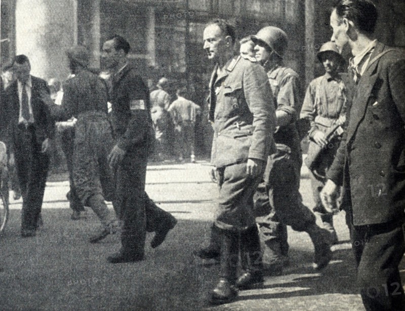 Captured German soldiers on the streets of Paris at the end of World War IICaptured German soldiers on the streets of Paris at the end of World War II