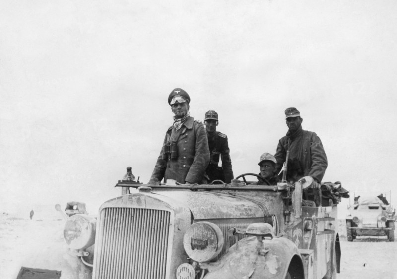 Rommel, Erwin 1891-1944
Officer, field marshall general , germany 
commander of the Afrikakorps Feb.1941-March1943
General (of the Panzertruppe) Rommel in his command post vehicle during the battle in Tobruk - Sidi Omar region. 
November 1941
