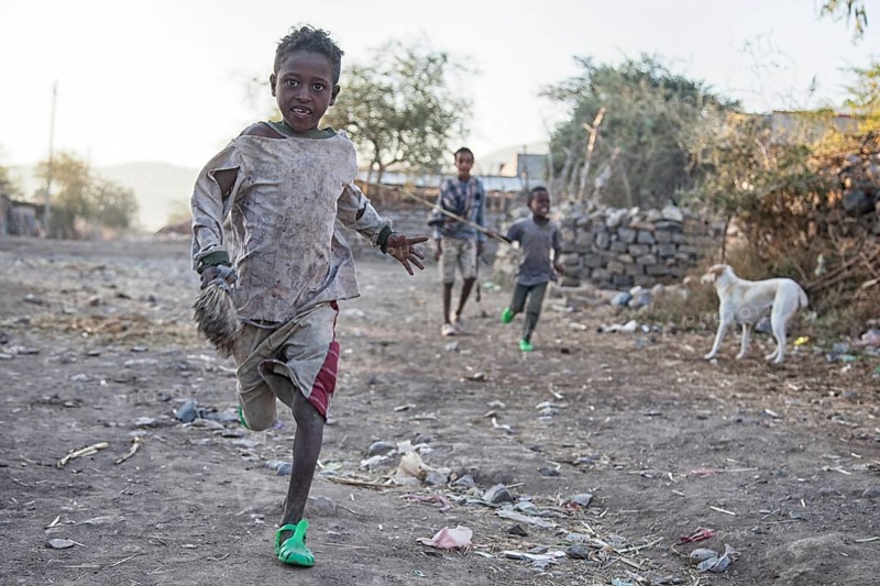 Children running on the street