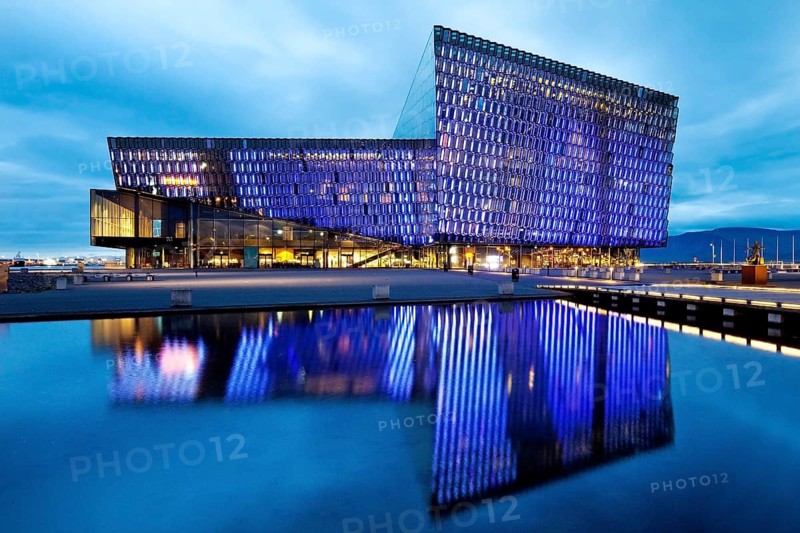 Illuminated Harpa Concert Hall at dusk