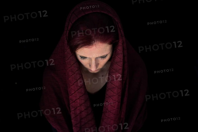 Woman with cloth on her head