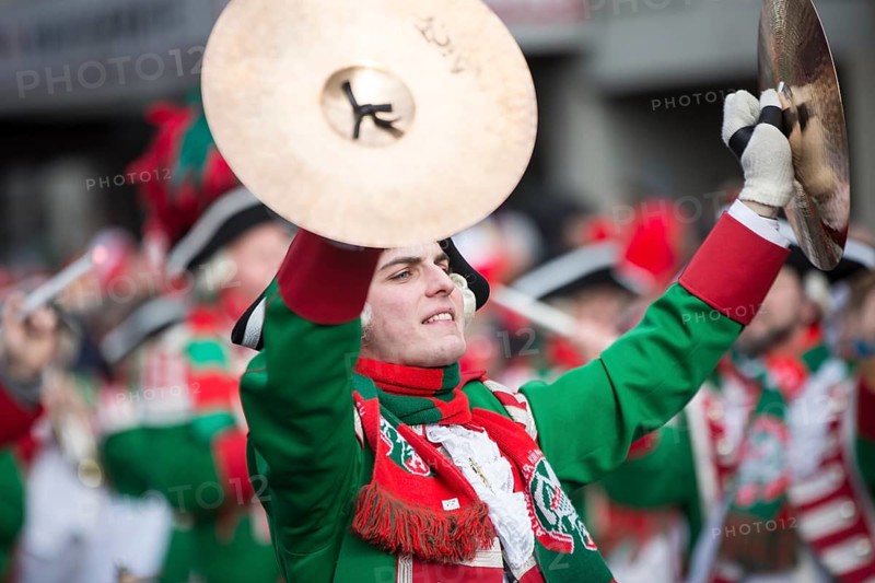Musician of a brass band with cymbals in uniform