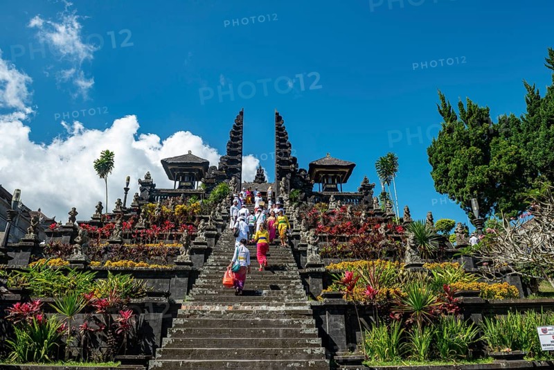 Devout Balinese descend stairs