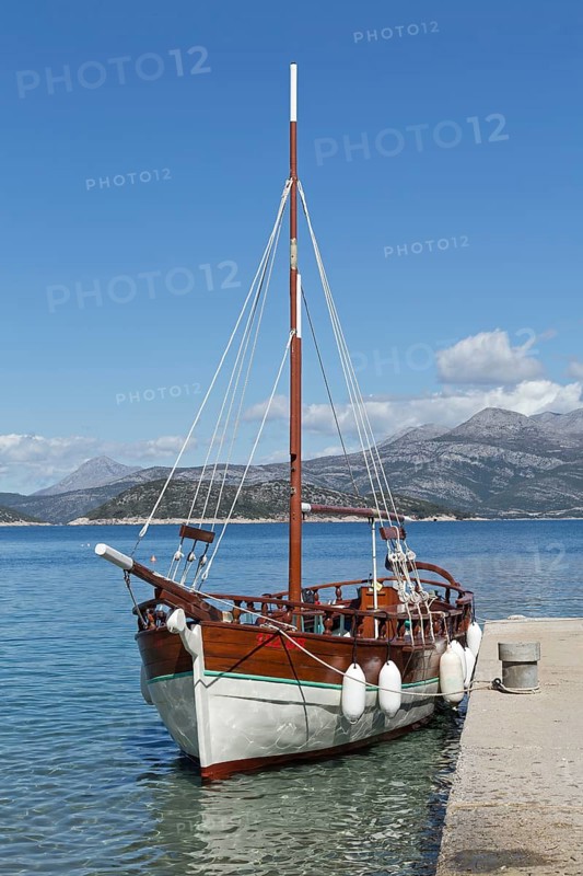 Sailboat at a jetty