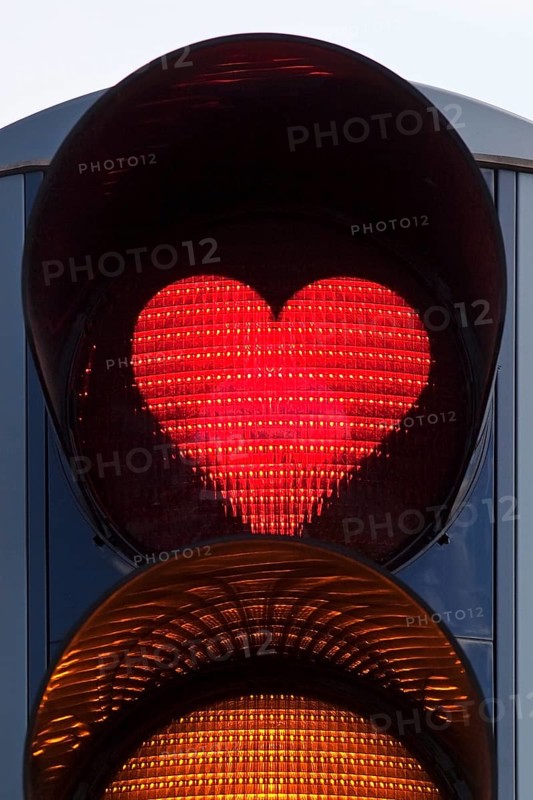 Traffic light with red heart