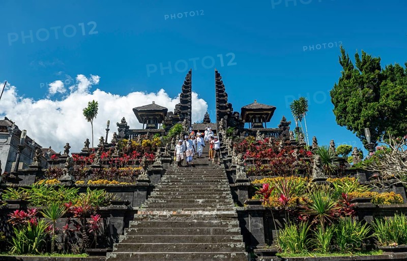 Devout Balinese descend stairs