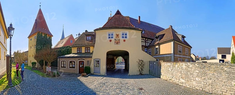 Old city wall with gate