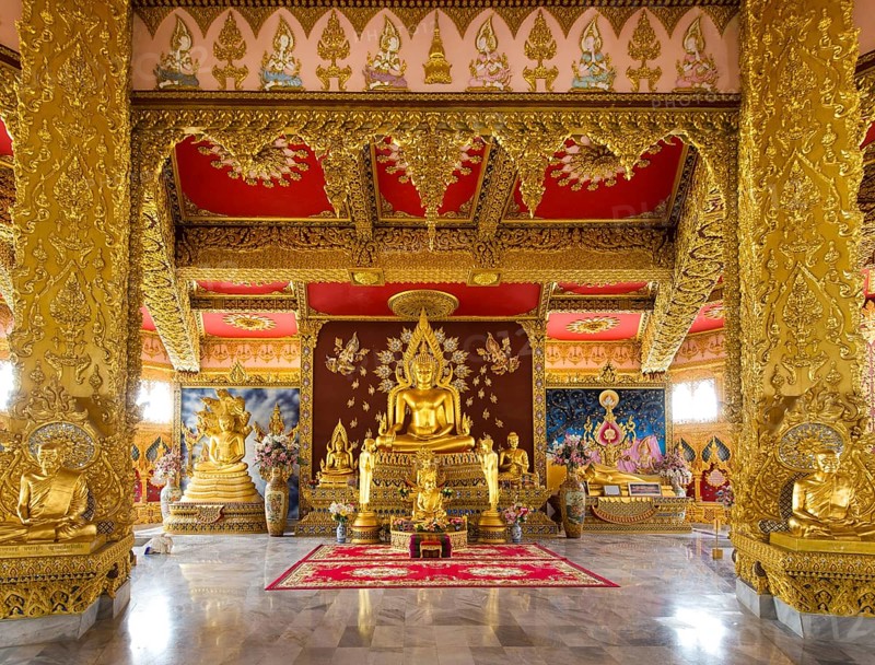 Gold plated Buddha statue in the altar of Phra Maha Chedi Chai Mongkhon Pagoda