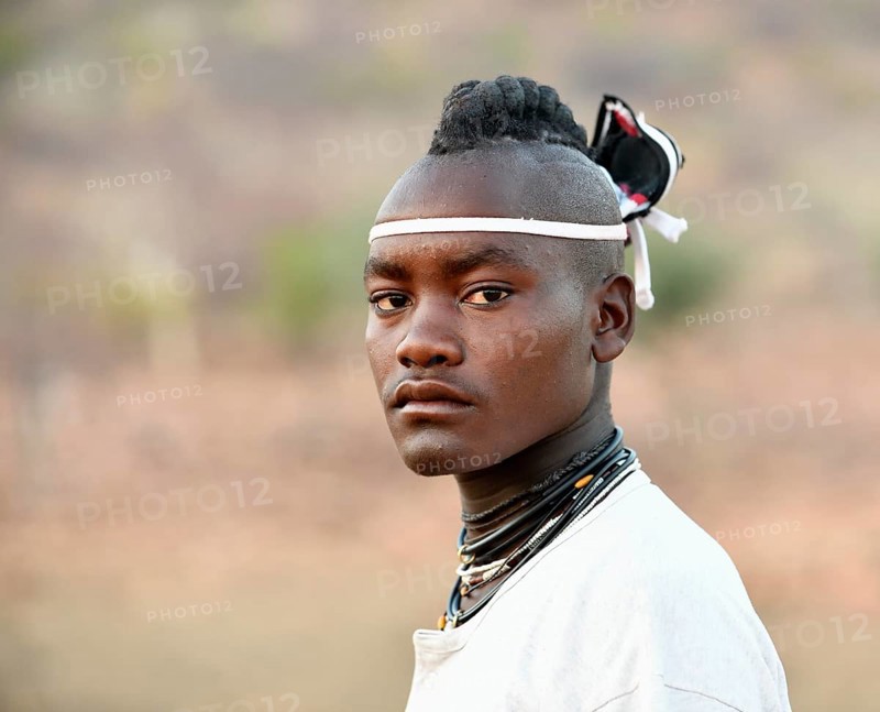 Young Himba man with traditional hairstyle