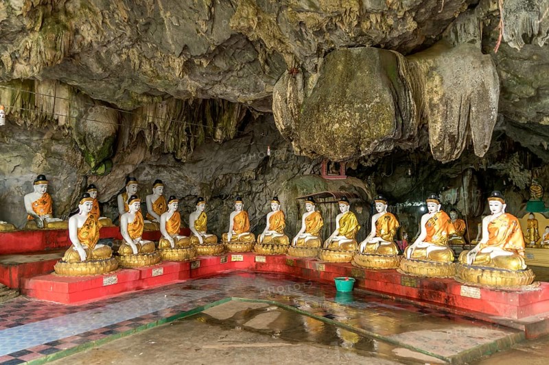 Sitting Buddha statues in the Bayin Nyi Cave Temple