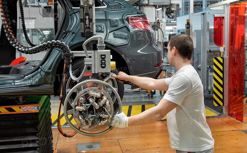 Installation of the wheels on the assembly line for Audi Q2 at the Audi AG plant in Ingolstadt